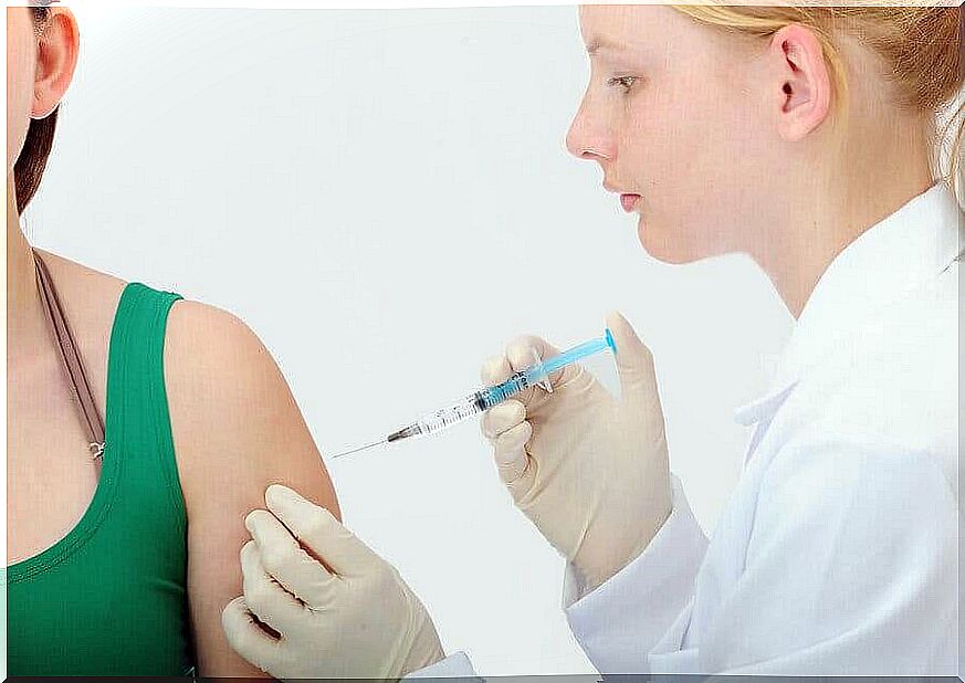 woman taking injection