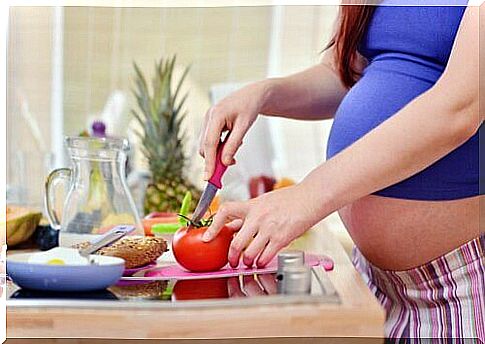 pregnant woman cooking