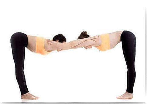 The Uttanasana position helps to stretch and open the shoulders.